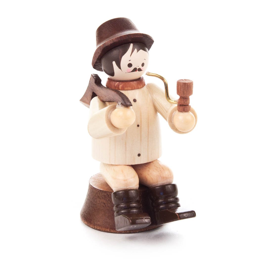 Forest Worker Sitting on Trunk