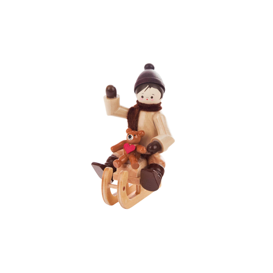 Child on Sled with Bear