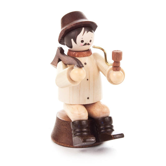 Forest Worker Sitting on Trunk